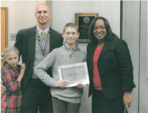 Principal Matt Kaiser, Will Kaiser, and Dr. Woodson