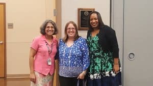 Principal Balagopal, Teacher Kristin Poindexter, and Superintendent Dr. Woodson